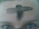 Ashes on forehead on Ash Wednesday